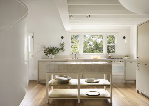 Emphasising practicality and lightness, the kitchen layout is 
