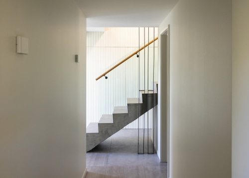 The sculptural stair as seen from the hallway 