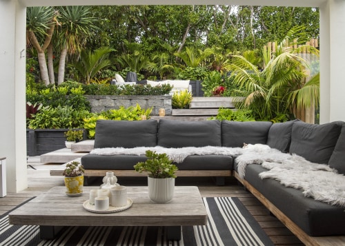 The covered al fresco lounge at pool side. 