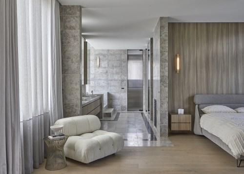 The contemporary reimagined master suite features refined detailing 