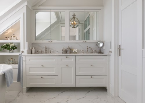 The traditional-appeal vanity includes the modern feature of 