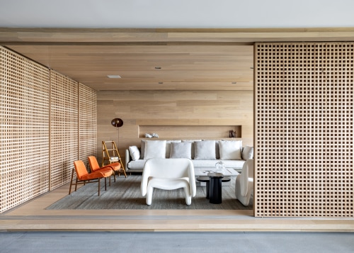 The intimate social space features wood on floor, 