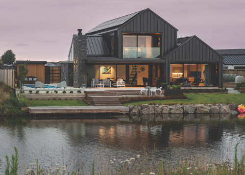 The home is intimately connected to Lake Hood. 