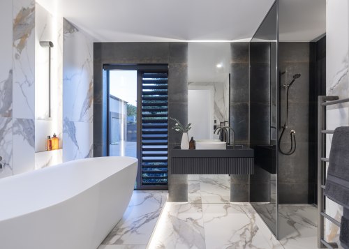 Contemporary louvres provide privacy and ventilation control. 