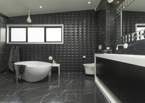 Given a large space for this master bathroom, black, countertop, floor, flooring, interior design, room, tile, wall, black