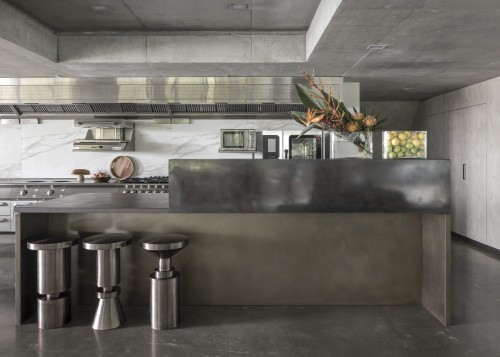 The chic breakfast stools have the look of 