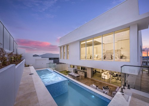 A bespoke, multi-level pool area forms part of 