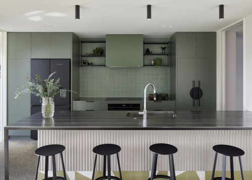Green is the block colour in the kitchen. 