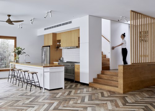 A herringbone floor creates a dramatic feature in 