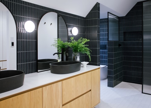 The existing ensuite and wardrobe were combined into 