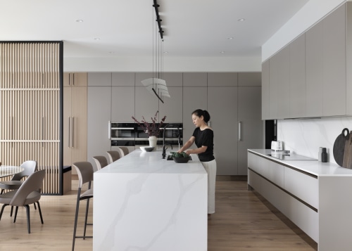 The contemporary kitchen with a wealth of storage. 