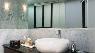 The view of a master bathroom of an bathroom, ceiling, countertop, interior design, room, sink, gray, black