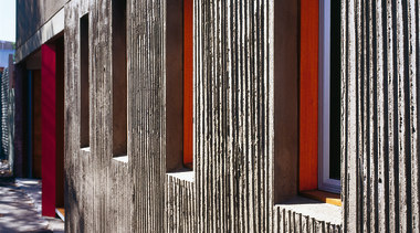 The view of the side of a home architecture, building, door, facade, house, siding, structure, wall, window, wood, black, white