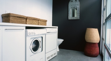 Laundry room with white appliances and cabinetry, toilet clothes dryer, floor, home, home appliance, interior design, laundry, laundry room, major appliance, product, room, washing machine, gray, black