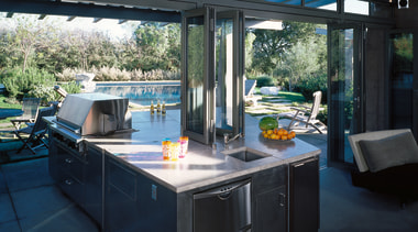 View of the kitchen area with indoor/outdoor flow outdoor structure, real estate, window, black