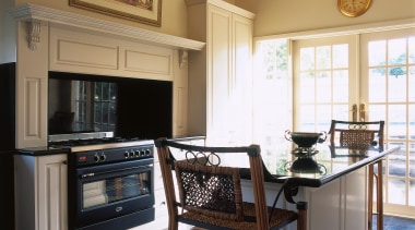 English Provincial style kitchen with cream walls and cabinetry, ceiling, countertop, cuisine classique, home, interior design, kitchen, living room, real estate, room, window, black