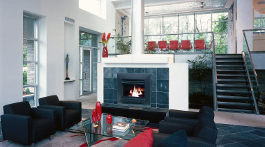 View of a contemporary set-up in this living fireplace, hearth, home, interior design, living room, room, gray, black