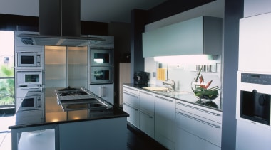 View of this contemporary kitchen - View of countertop, cuisine classique, home appliance, interior design, kitchen, kitchen appliance, black, gray