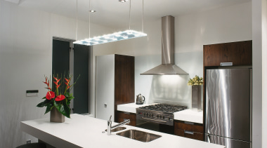 A kitchen featuring an Itailan styled pendant above countertop, interior design, kitchen, product design, gray, white, black