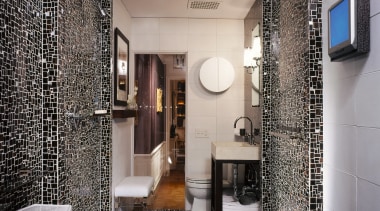 View of this bathroom surrounded by tiles - bathroom, ceiling, floor, home, interior design, room, tile, wall, gray, black