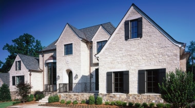 View of the front of the home - building, cottage, elevation, estate, facade, farmhouse, historic house, home, house, mansion, neighbourhood, property, real estate, residential area, roof, siding, sky, suburb, window, blue