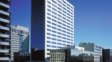 Exterior of highrise tower building with metallic finish architecture, building, city, cityscape, commercial building, condominium, corporate headquarters, daytime, downtown, facade, headquarters, metropolis, metropolitan area, mixed use, real estate, residential area, sky, skyscraper, tower block, urban area, blue, black