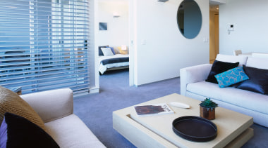 Interior view of an apartments lounge area - interior design, living room, real estate, room, suite, white