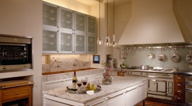View of the kitchen - View of the ceiling, countertop, floor, flooring, interior design, kitchen, living room, room, table, wood flooring, brown