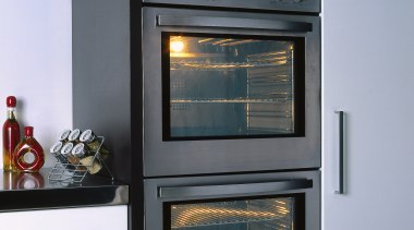 Close view of these wall oven kitchen appliances. home appliance, kitchen appliance, oven, gray