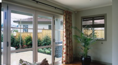 View of this living room - View of ceiling, daylighting, door, home, house, interior design, living room, real estate, window, window covering, window treatment, gray