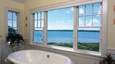 An interior view of bathroom and view outside bathroom, bathtub, daylighting, estate, home, interior design, property, real estate, room, window, gray