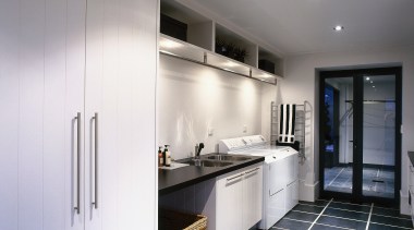 view of this laundry that doubles as a cabinetry, countertop, interior design, kitchen, real estate, room, gray, white