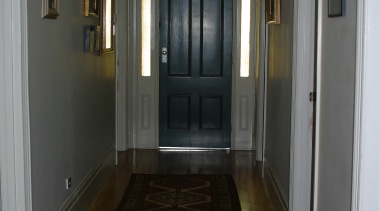 Hallway of villa with timber floor, long runner ceiling, door, estate, floor, flooring, hall, hardwood, home, house, interior design, laminate flooring, lighting, property, real estate, room, stairs, wall, window, wood, wood flooring, black, gray