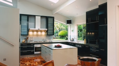 view of the kitchen an dining area - cabinetry, ceiling, countertop, interior design, kitchen, real estate, room, under cabinet lighting, gray