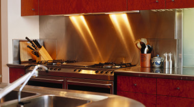 view of the stainless steel  benchtop and cabinetry, countertop, flooring, interior design, kitchen, room, under cabinet lighting, red, brown