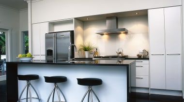 Kitchen with light coloured cabinetry and black granite cabinetry, countertop, interior design, kitchen, room, white