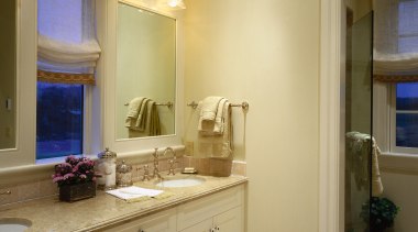 View of a bathroom, off-white tiled flooring, white bathroom, bathroom accessory, bathroom cabinet, cabinetry, ceiling, countertop, floor, home, interior design, kitchen, lighting, room, sink, brown, orange