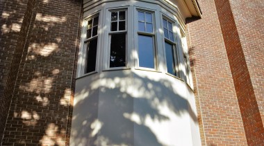 View of a Georgian home, large high brick apartment, architecture, brick, building, daytime, estate, facade, home, house, landmark, mansion, neighbourhood, property, real estate, residential area, siding, sky, structure, wall, window, black