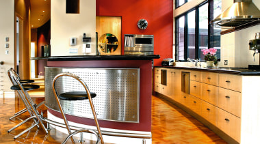view of the kitchen area showing curved cabinetry, cabinetry, countertop, cuisine classique, floor, flooring, hardwood, interior design, kitchen, real estate, room, wood flooring, white