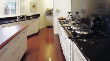 view of the hi-macs acrylic solid surface benchtop countertop, floor, flooring, hardwood, kitchen, room, white, black