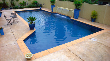 Blue coloured outdoor pool with terracotta coloured paving, backyard, floor, flooring, leisure, property, real estate, swimming pool, gray