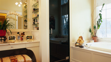 Bathroom with cream walls, timber flooring, white bath, interior design, room, window, orange