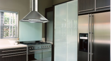 view of the kitchen and rangehood - view cabinetry, countertop, home appliance, interior design, kitchen, real estate, room, gray, black