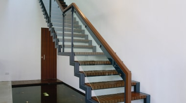 view of the stairway leading up over the architecture, baluster, daylighting, floor, glass, handrail, interior design, real estate, stairs, structure, wood, gray