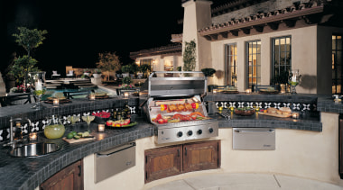 View of an overall patio area, concrete tiled black, gray