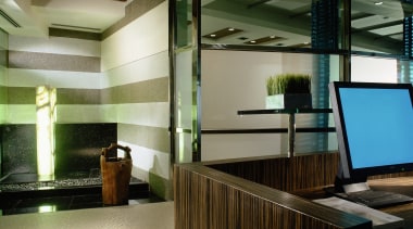 view of the bank reception showing water feature architecture, ceiling, glass, interior design, lobby, brown, black