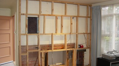 view of the frame of the new wall bookcase, cabinetry, cupboard, door, furniture, home, room, shelf, shelving, wall, wardrobe, window, wood stain, gray, brown