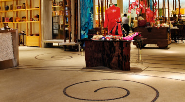 View of the polished concrete flooring in the flooring, interior design, lobby, shopping mall, brown, orange