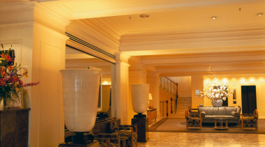 Lobby area with ornate columns and ceiling mouldings. ceiling, estate, flooring, function hall, home, interior design, lobby, real estate, room, orange, brown