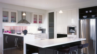 Kitchen with dark coloured cabinetry and white benchtops cabinetry, countertop, cuisine classique, interior design, kitchen, real estate, room, gray, black